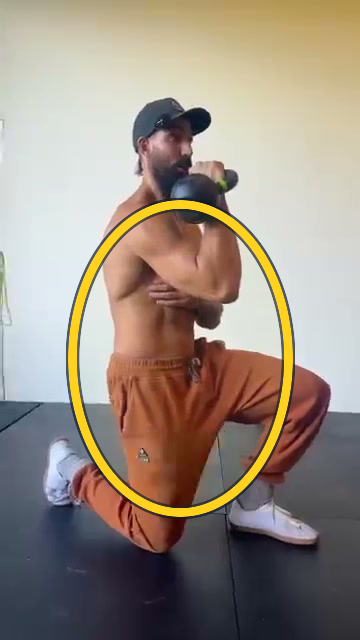 Half-kneeling single-arm overhead press exercise frame highlight