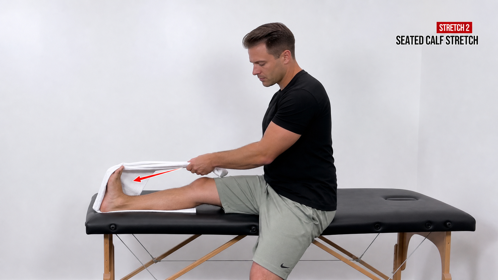 Seated calf stretch with towel exercise frame highlight